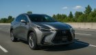 2025 Lexus NX 350h luxury SUV driving on highway near Vancouver on sunny day