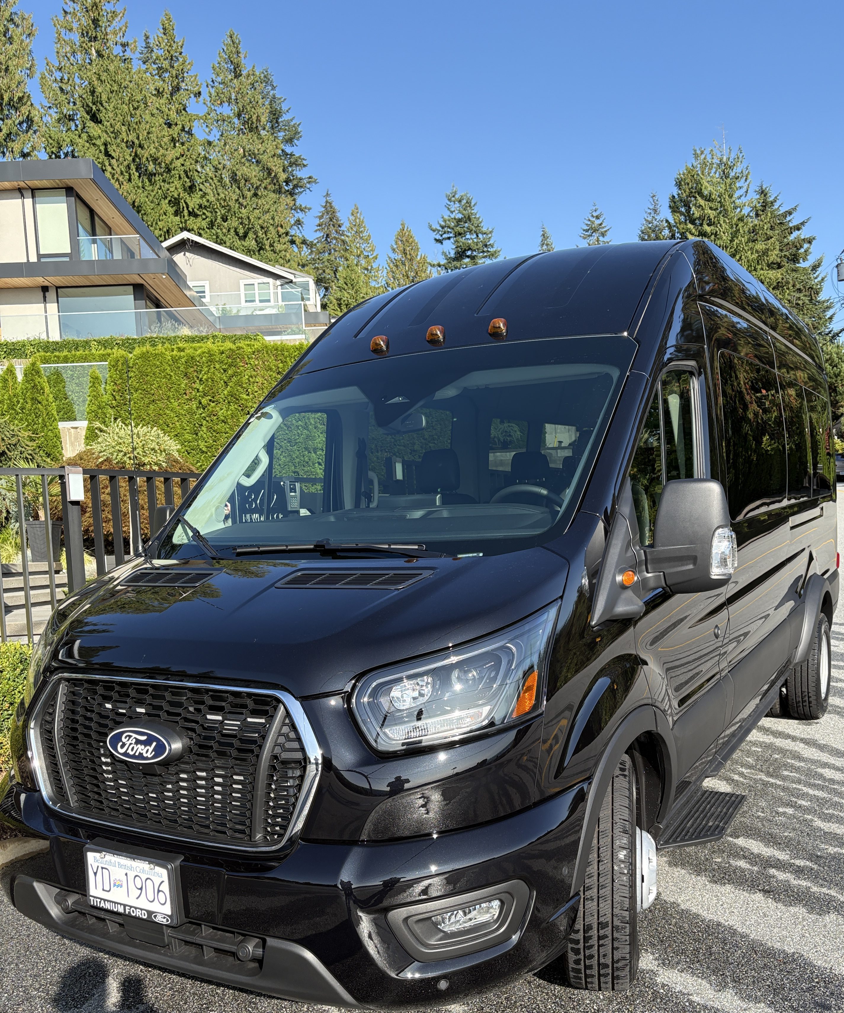 Black 15 passenger AWD Ford Transit rental in Vancouver