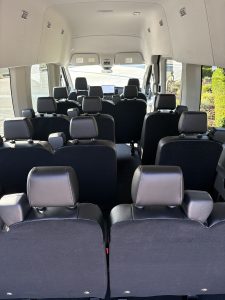 15 passenger seating inside Ford Transit AWD rental van